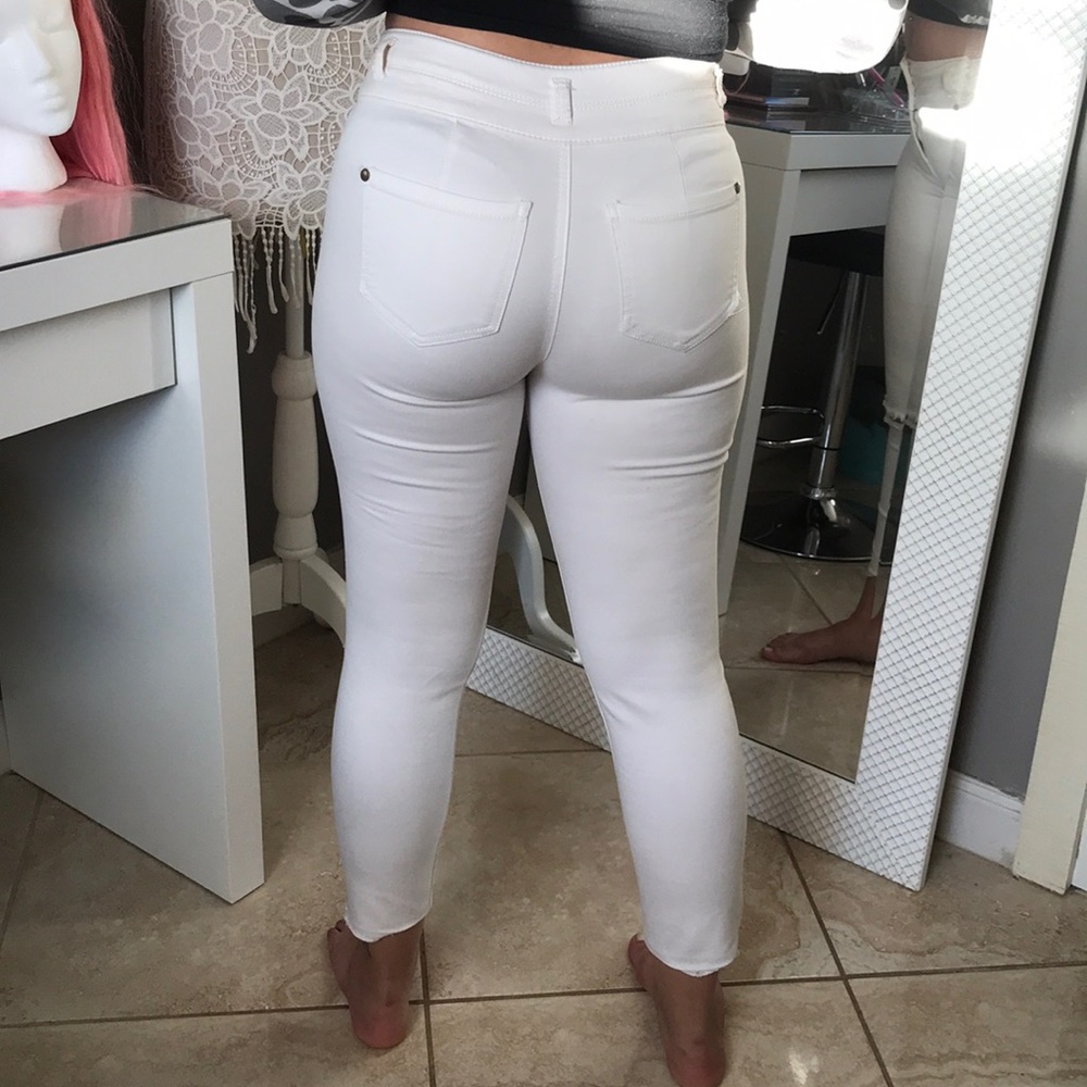 White cropped knee slit pants